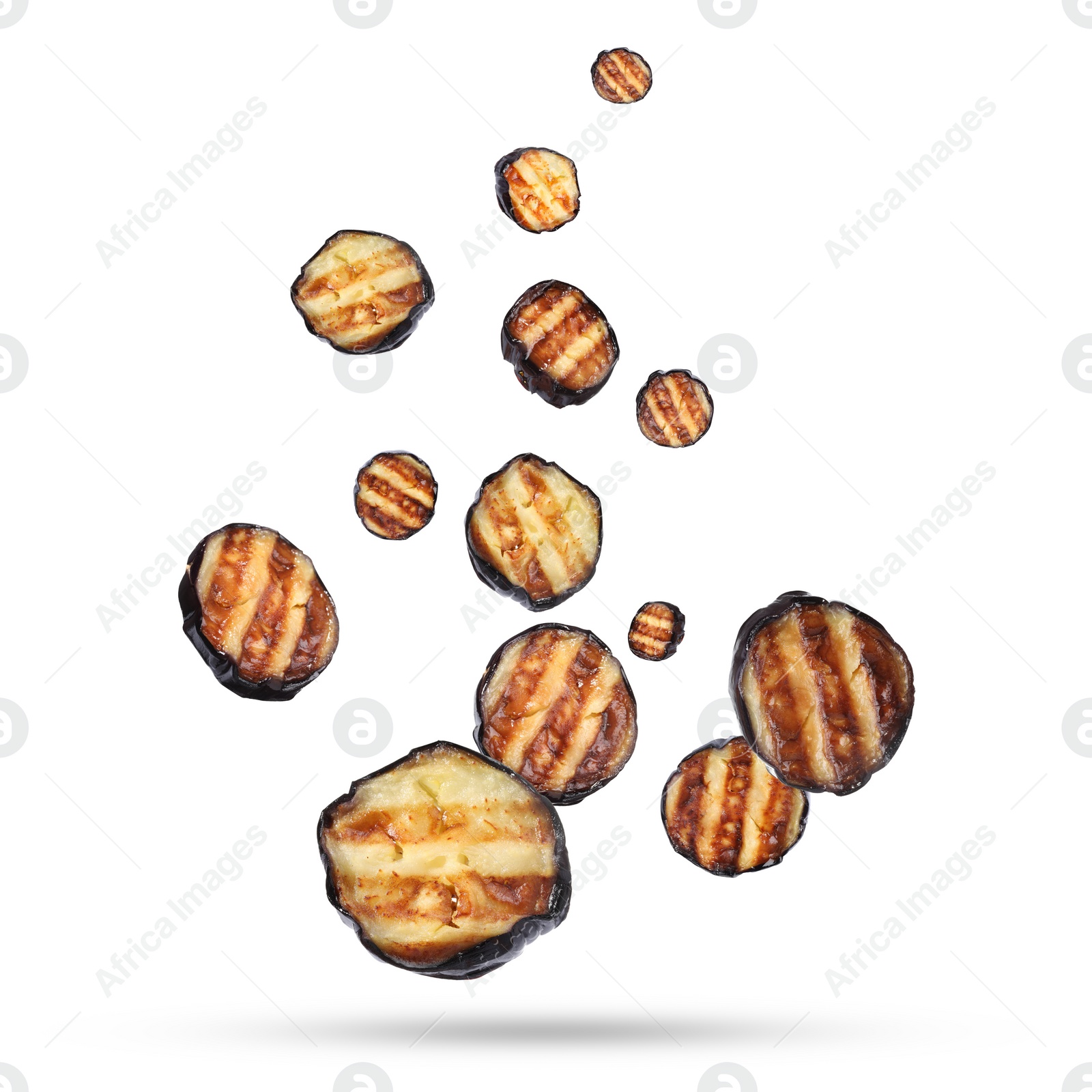 Image of Slices of grilled eggplants in air on white background