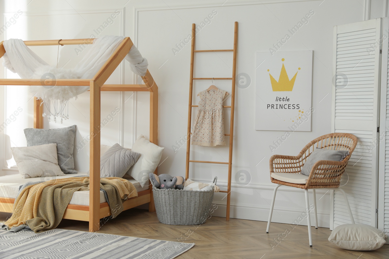 Photo of Stylish child room interior with house bed