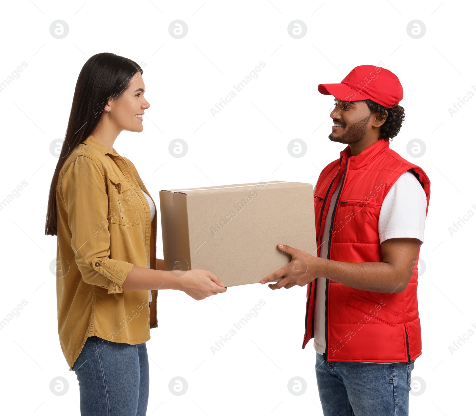 Photo of Smiling courier giving parcel to receiver on white background