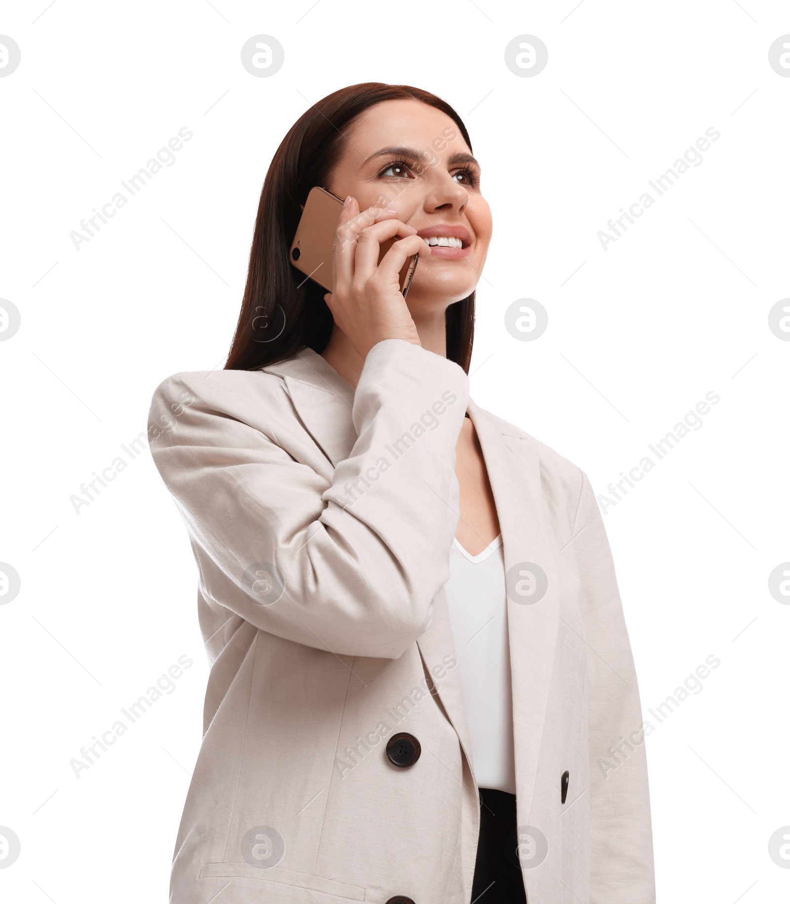 Photo of Beautiful businesswoman in suit talking on smartphone against white background, low angle view