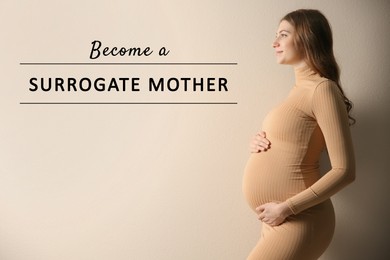 Surrogate mother. Pregnant woman touching her belly on beige background