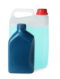 Photo of Blue bottle and canister on white background