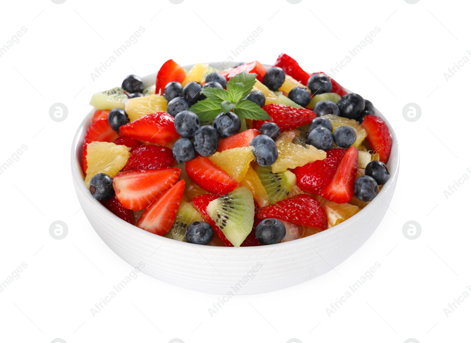 Photo of Tasty fruit salad in bowl isolated on white