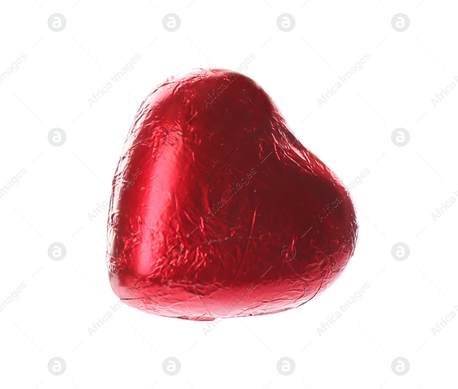 Photo of Heart shaped chocolate candy in red foil isolated on white