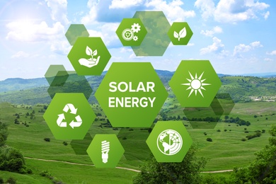 Image of Solar energy concept. Scheme with icons and green hills on background