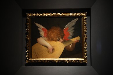 Photo of Florence, Italy - February 8, 2024: Famous painting "Angel Musician" by Rosso Fiorentino at Uffizi gallery