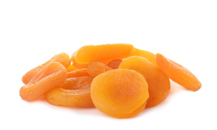 Photo of Tasty apricots on white background. Dried fruit as healthy food