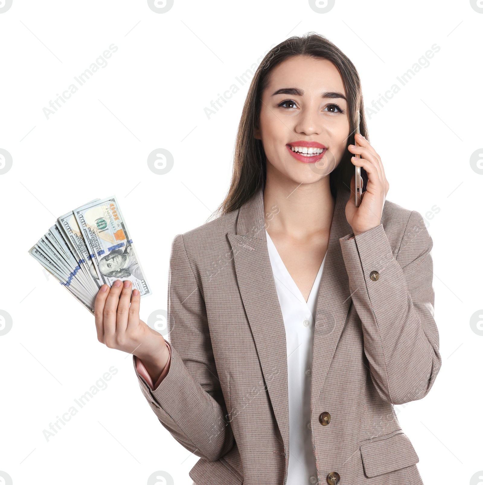 Photo of Happy young businesswoman with money talking on phone against white background