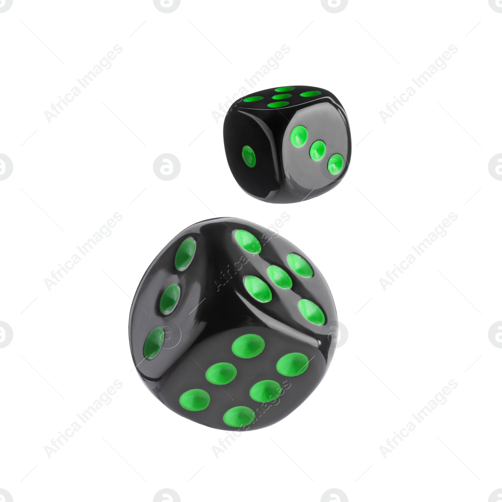 Image of Two black dice in air on white background