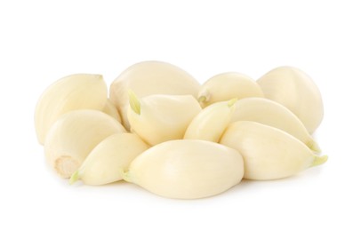 Photo of Peeled cloves of fresh garlic isolated on white