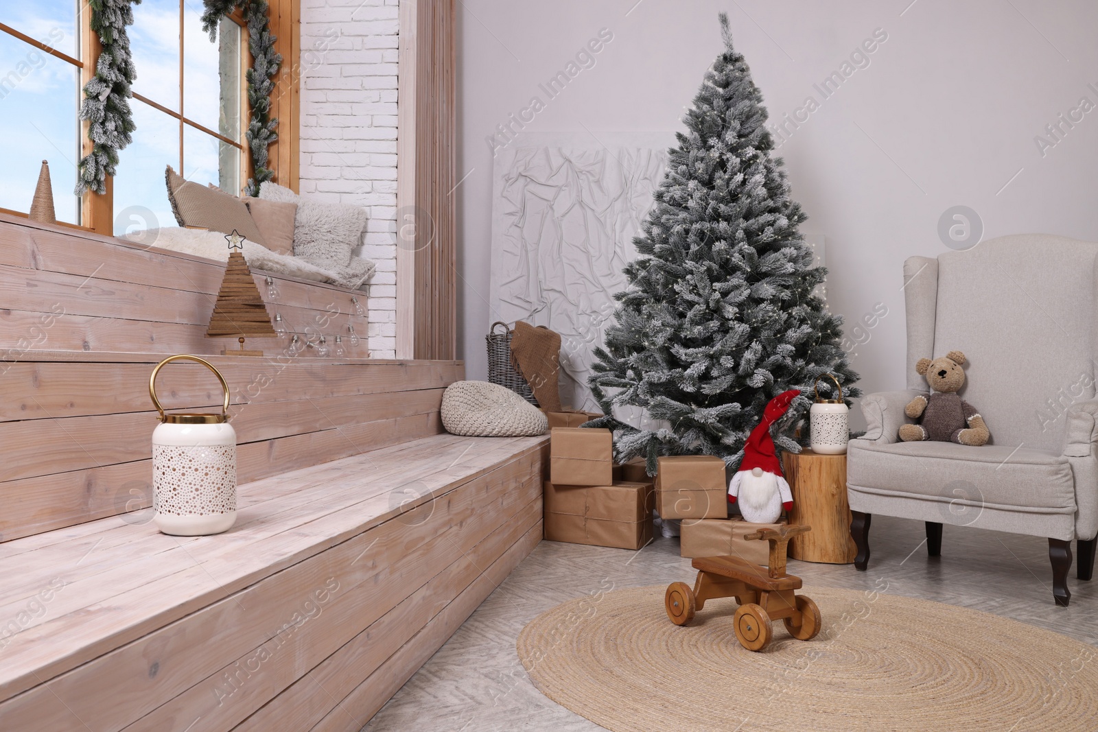 Photo of Stylish room interior with Christmas tree and festive decor