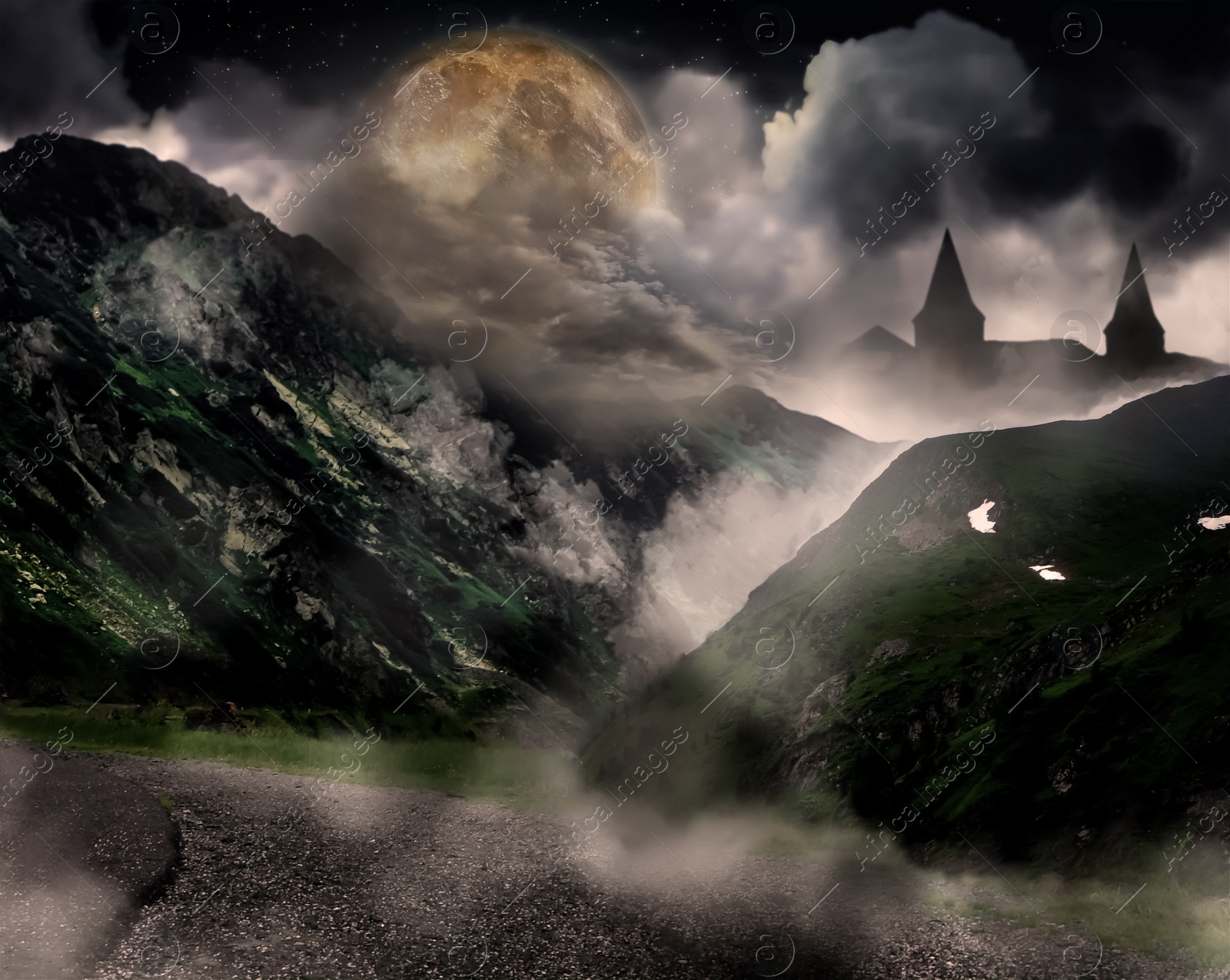 Image of Fantasy world. Mystical castle and mountains covering with fog in night