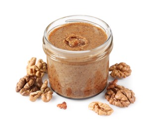 Photo of Delicious nut butter and walnuts isolated on white