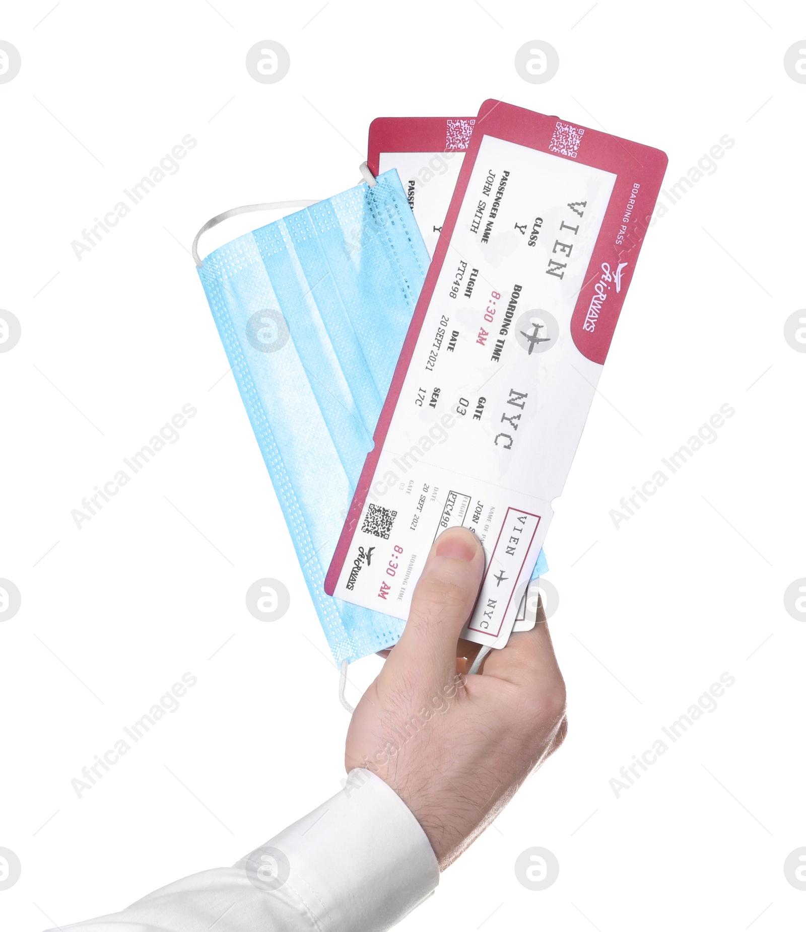 Photo of Man holding tickets and protective mask on white background, closeup. Travel during quarantine