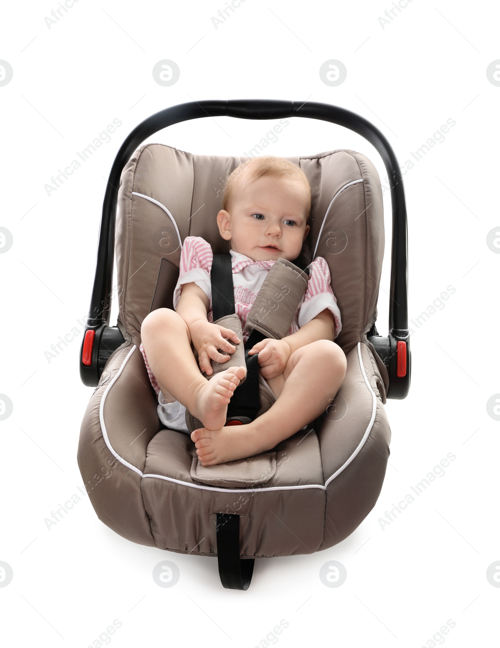 Photo of Adorable baby in child safety seat on white background