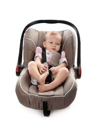 Photo of Adorable baby in child safety seat on white background