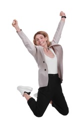 Beautiful happy businesswoman jumping on white background