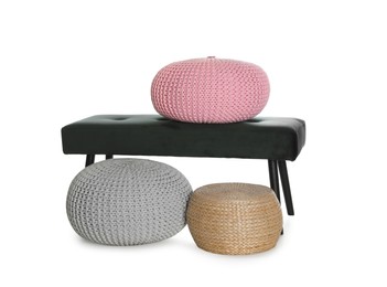 Photo of Different poufs and bench on white background. Home design