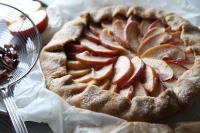 Delicious apple galette on table, closeup view