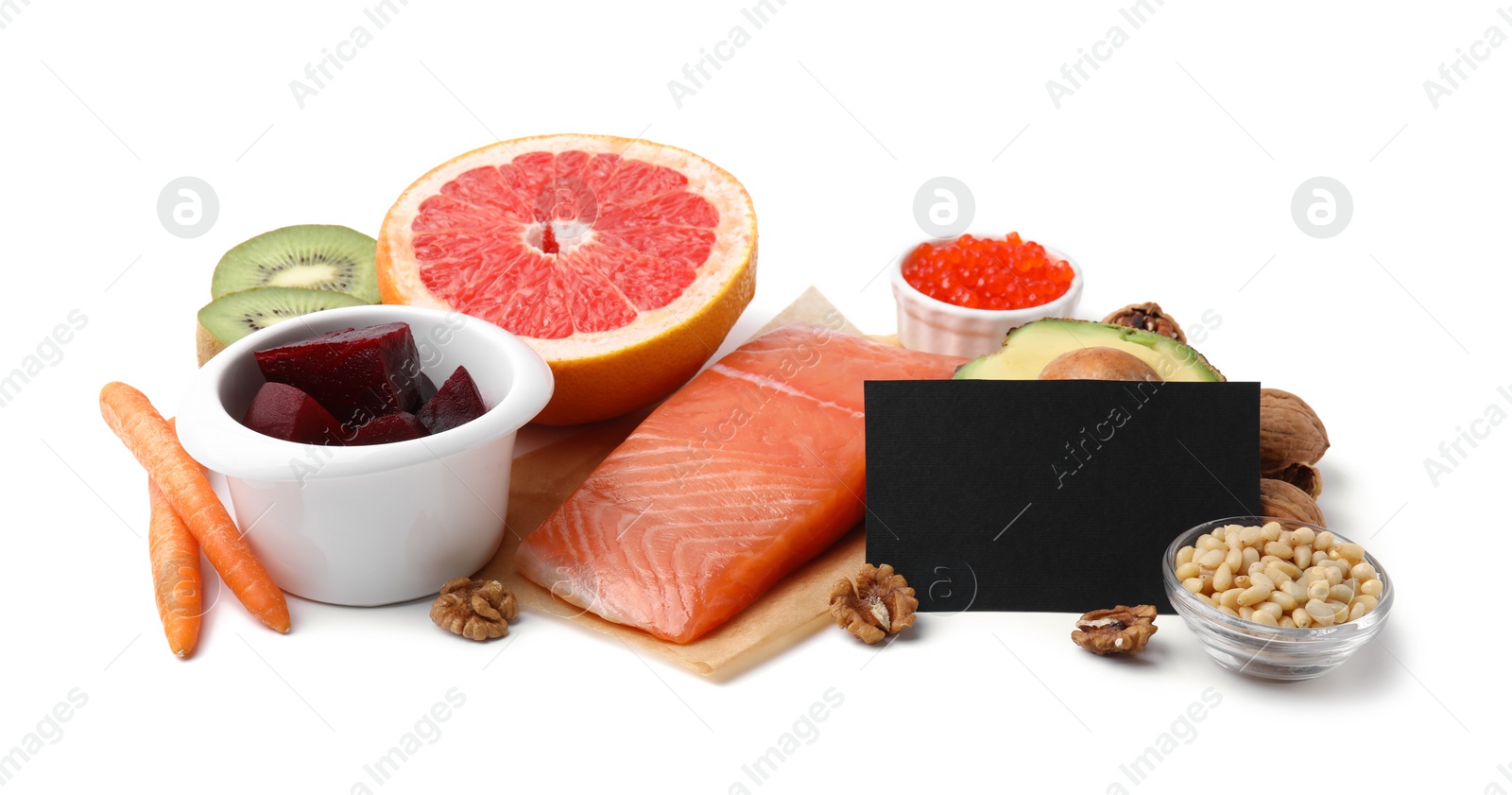 Photo of Many different products and blank card isolated on white. Natural sources of serotonin