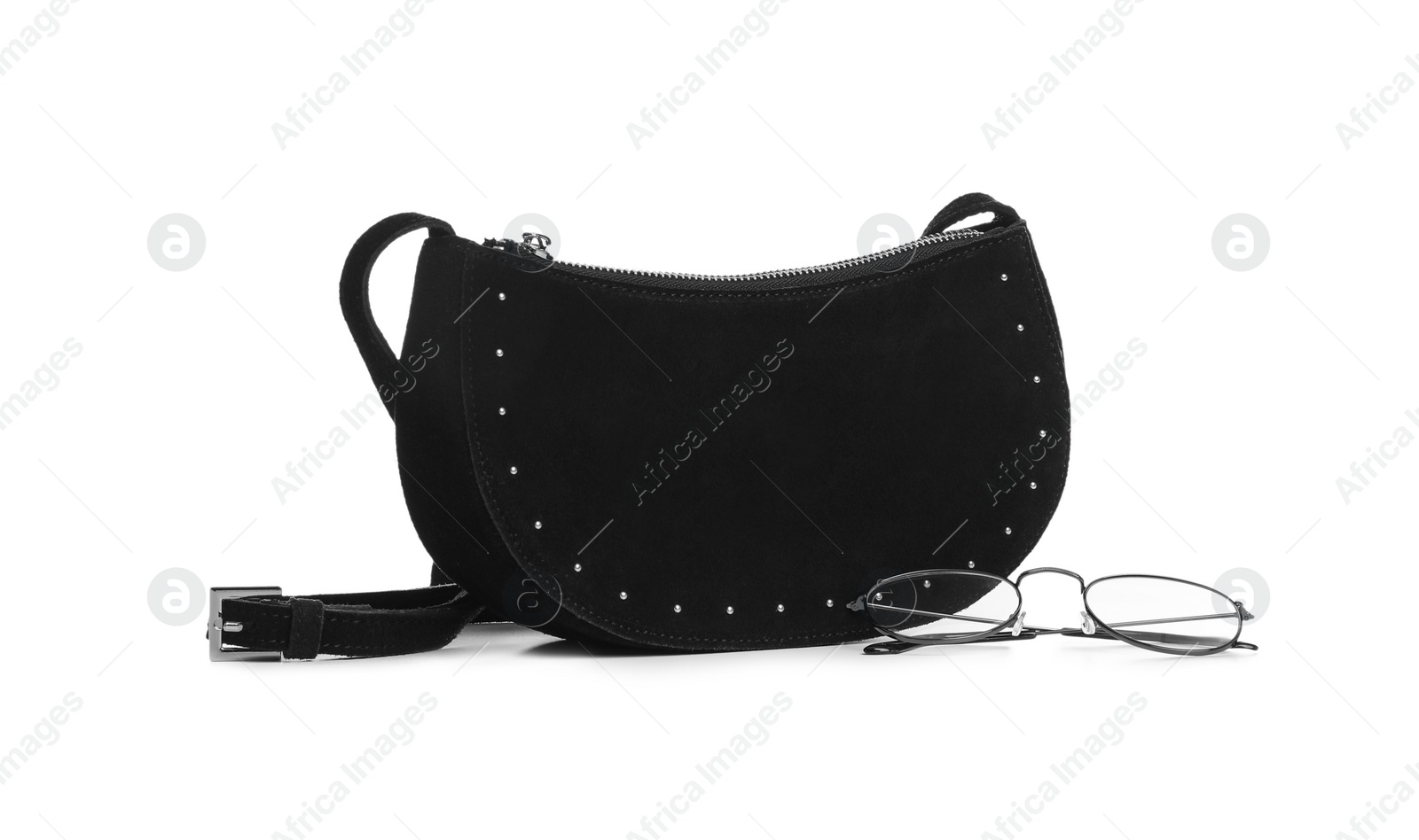 Photo of Stylish woman's bag and glasses isolated on white