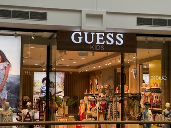 Photo of Poland, Warsaw - July 12, 2022: Official Guess store for kids in shopping mall