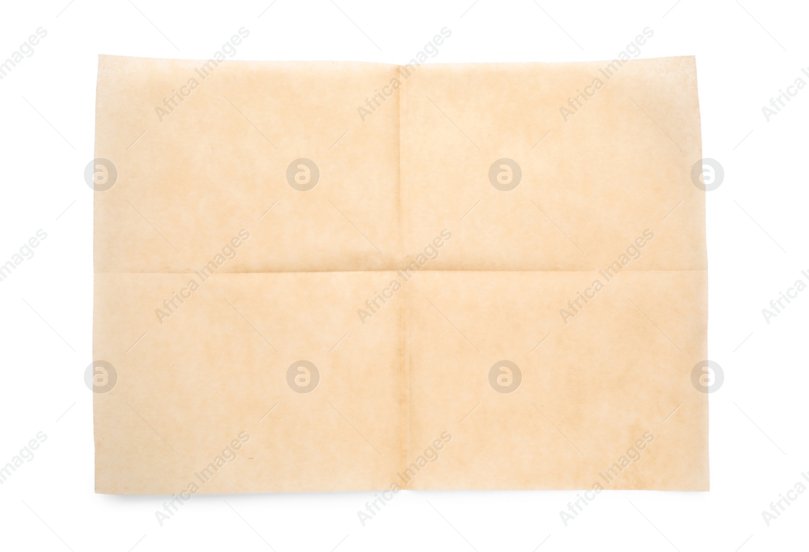 Photo of Sheet of brown baking paper on white background, top view