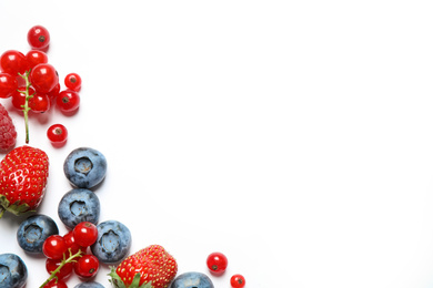 Photo of Mix of fresh berries on white background, flat lay