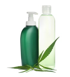 Photo of Set of hemp cosmetics with green leaves isolated on white