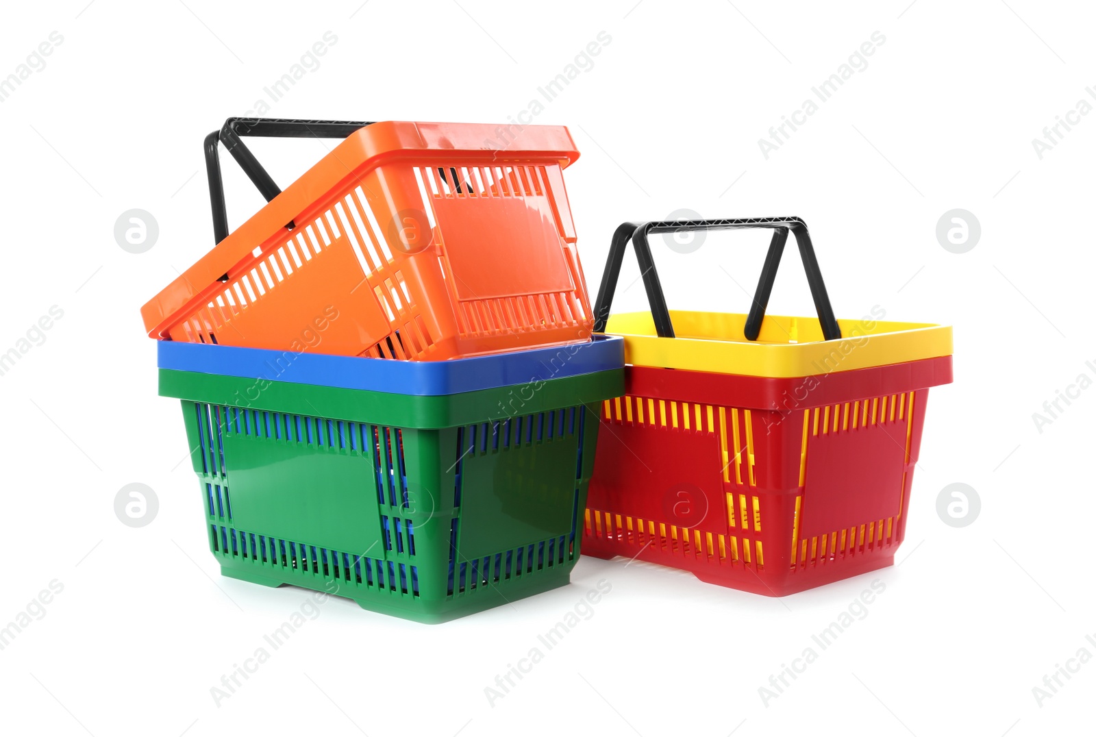 Photo of Colorful plastic shopping baskets on white background