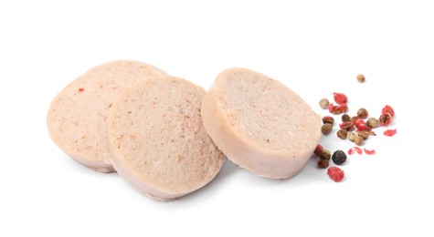 Photo of Slices of delicious liver sausage and peppercorns on white background