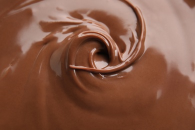 Sweet tasty chocolate cream as background, closeup