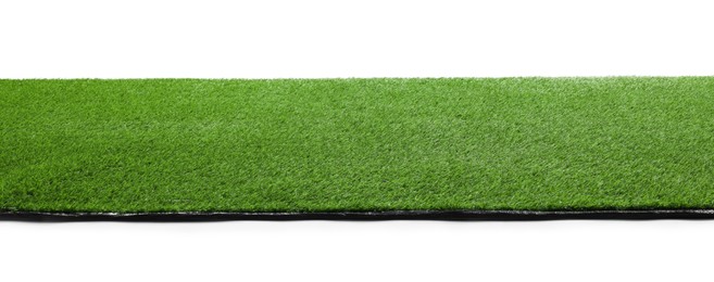 Photo of Green artificial grass surface isolated on white