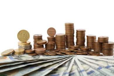 Dollar bills and coins on white background