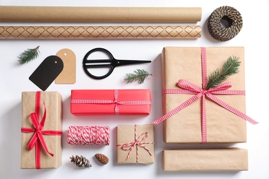 Flat lay composition with gift boxes on white background