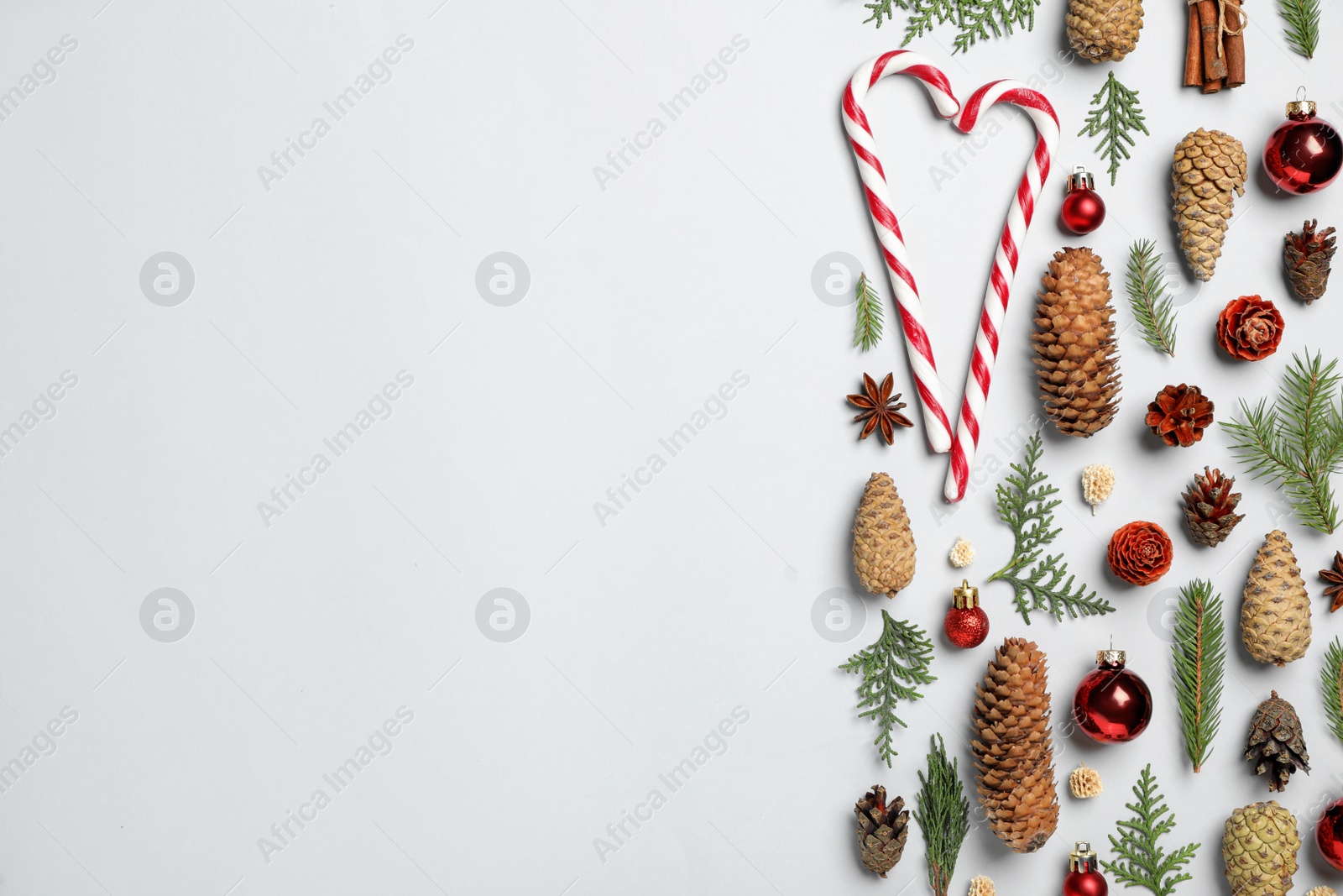Photo of Flat lay composition with pinecones on white background, space for text