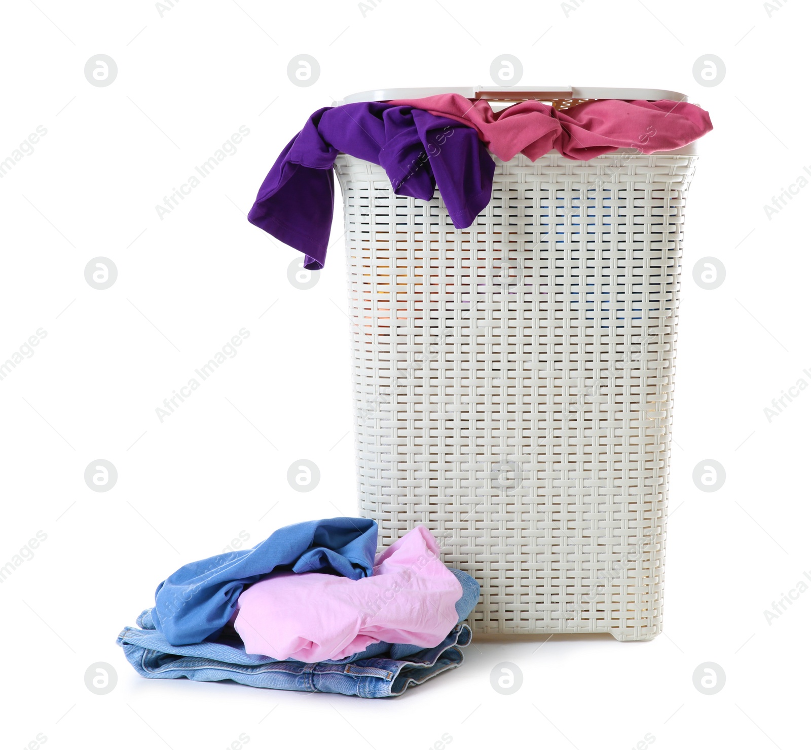 Photo of Laundry basket with dirty clothes isolated on white