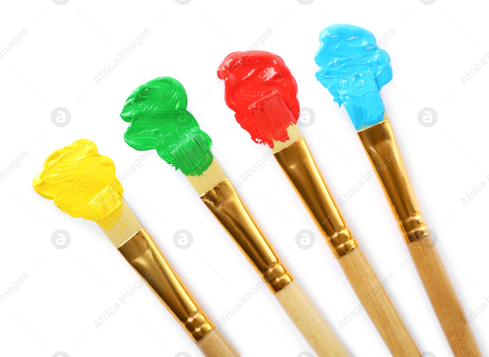 Photo of Brushes with colorful paints and strokes on white background, top view