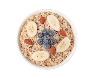 Photo of Tasty boiled oatmeal with blueberries, banana and almonds in bowl isolated on white, top view