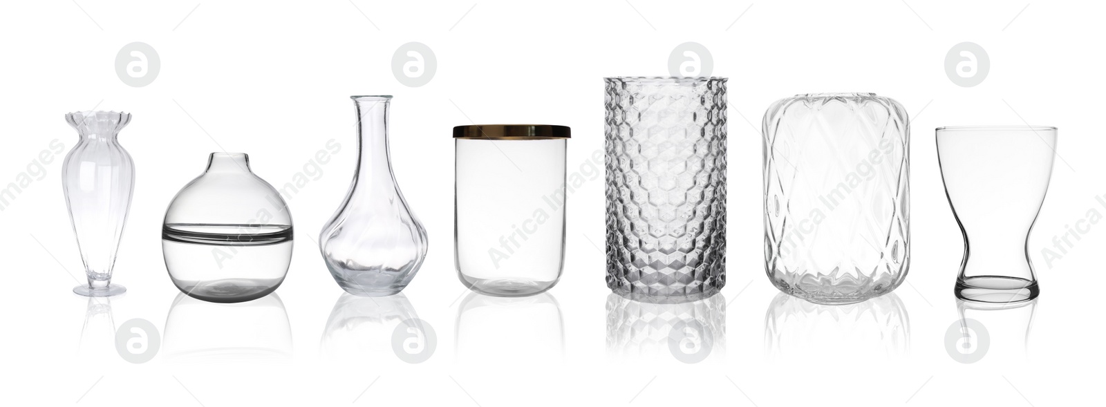 Image of Set of empty glass vases on white background. Banner design