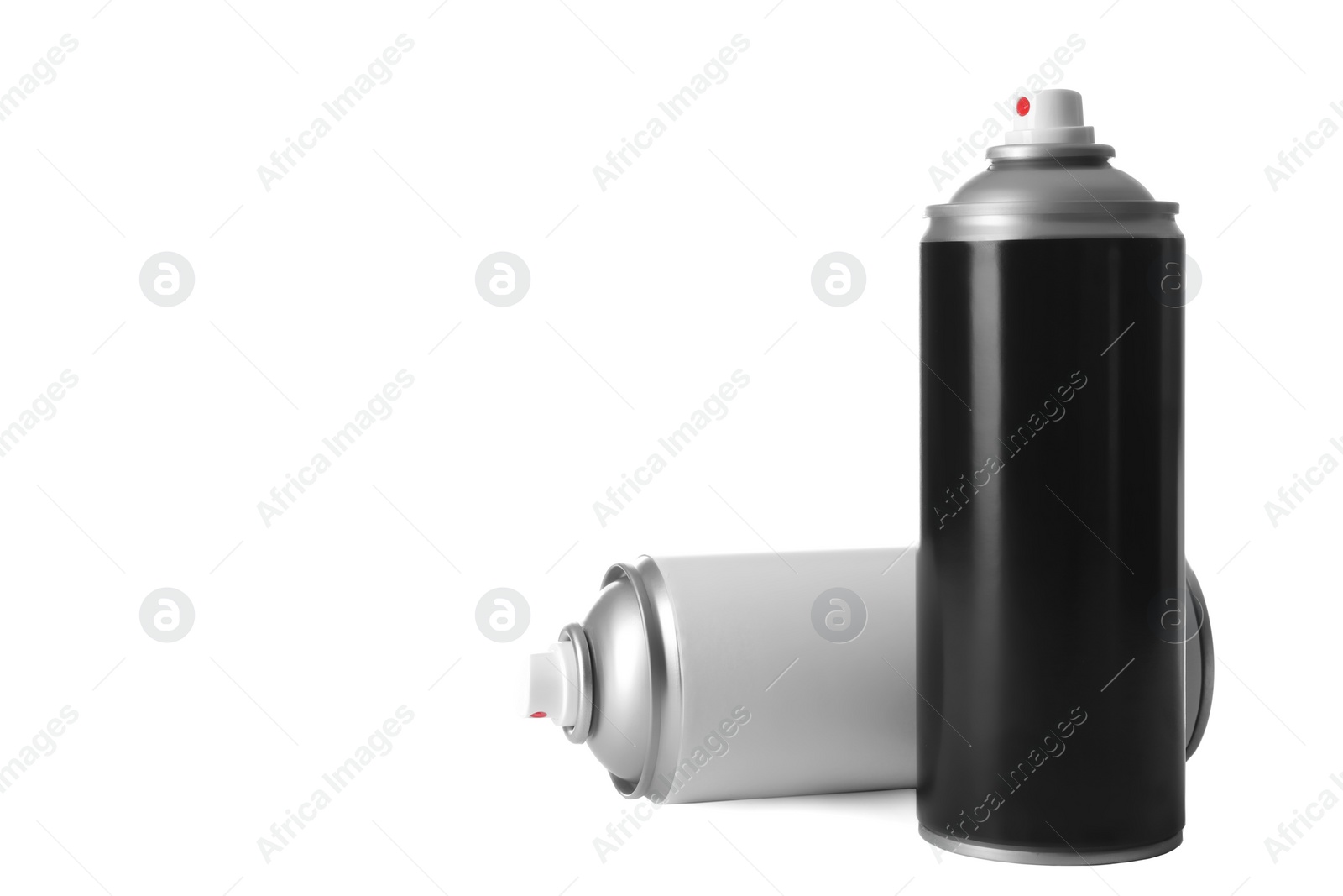 Photo of Cans of different spray paints on white background