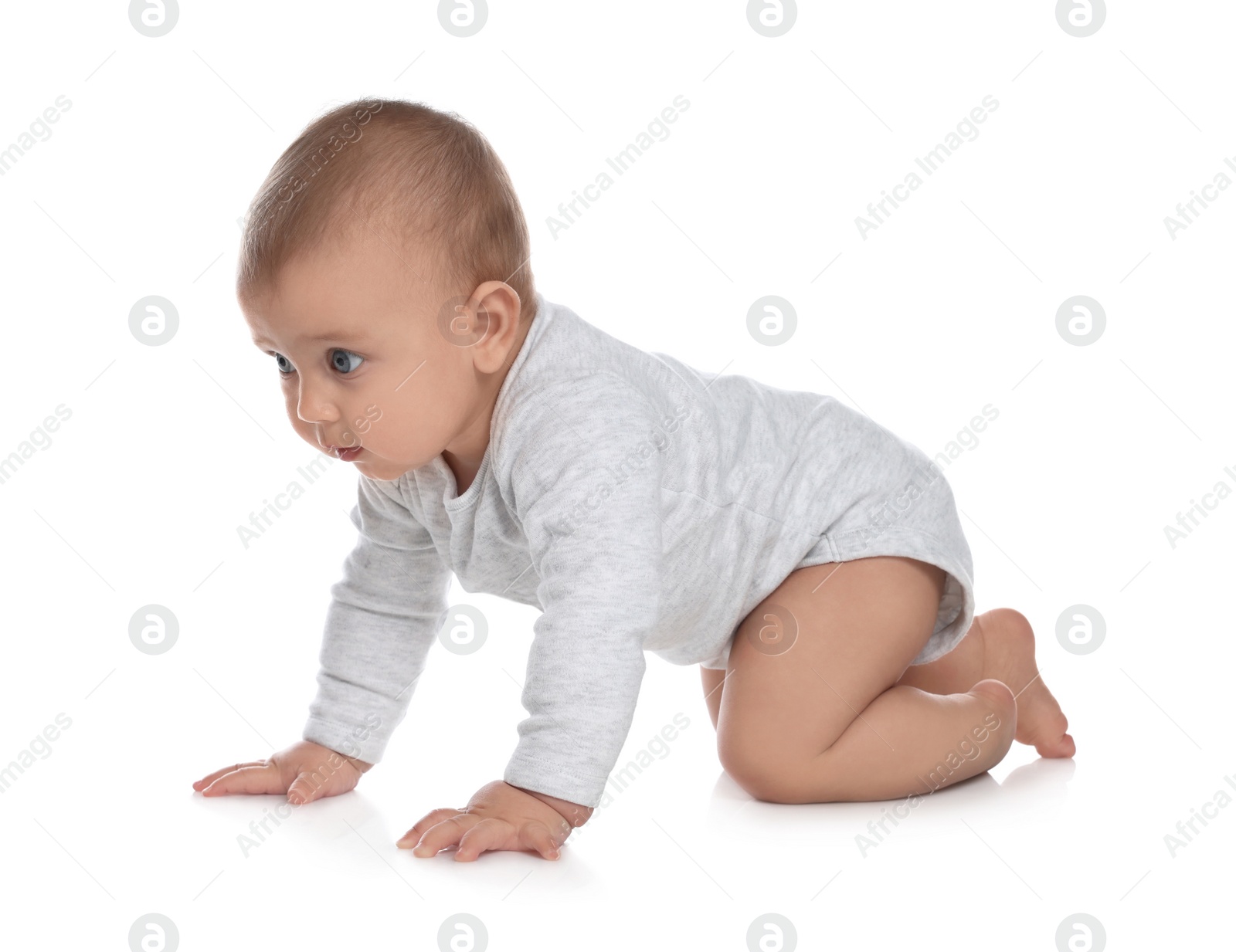 Photo of Cute little baby crawling on white background