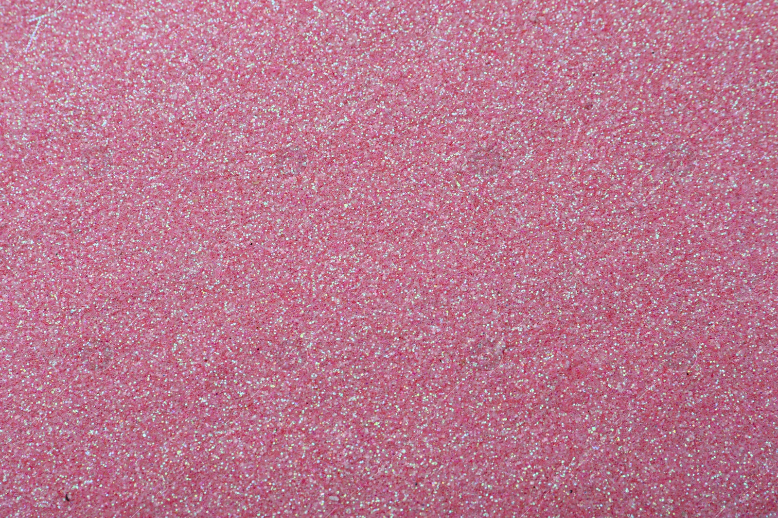 Photo of Beautiful shiny pink glitter as background, closeup