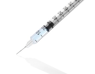 Photo of Disposable syringe with needle and medicine isolated on white