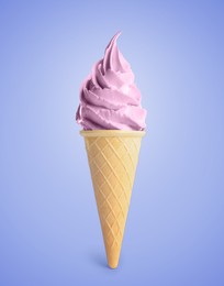 Image of Tasty berry ice cream in waffle cone on pastel blue background. Soft serve