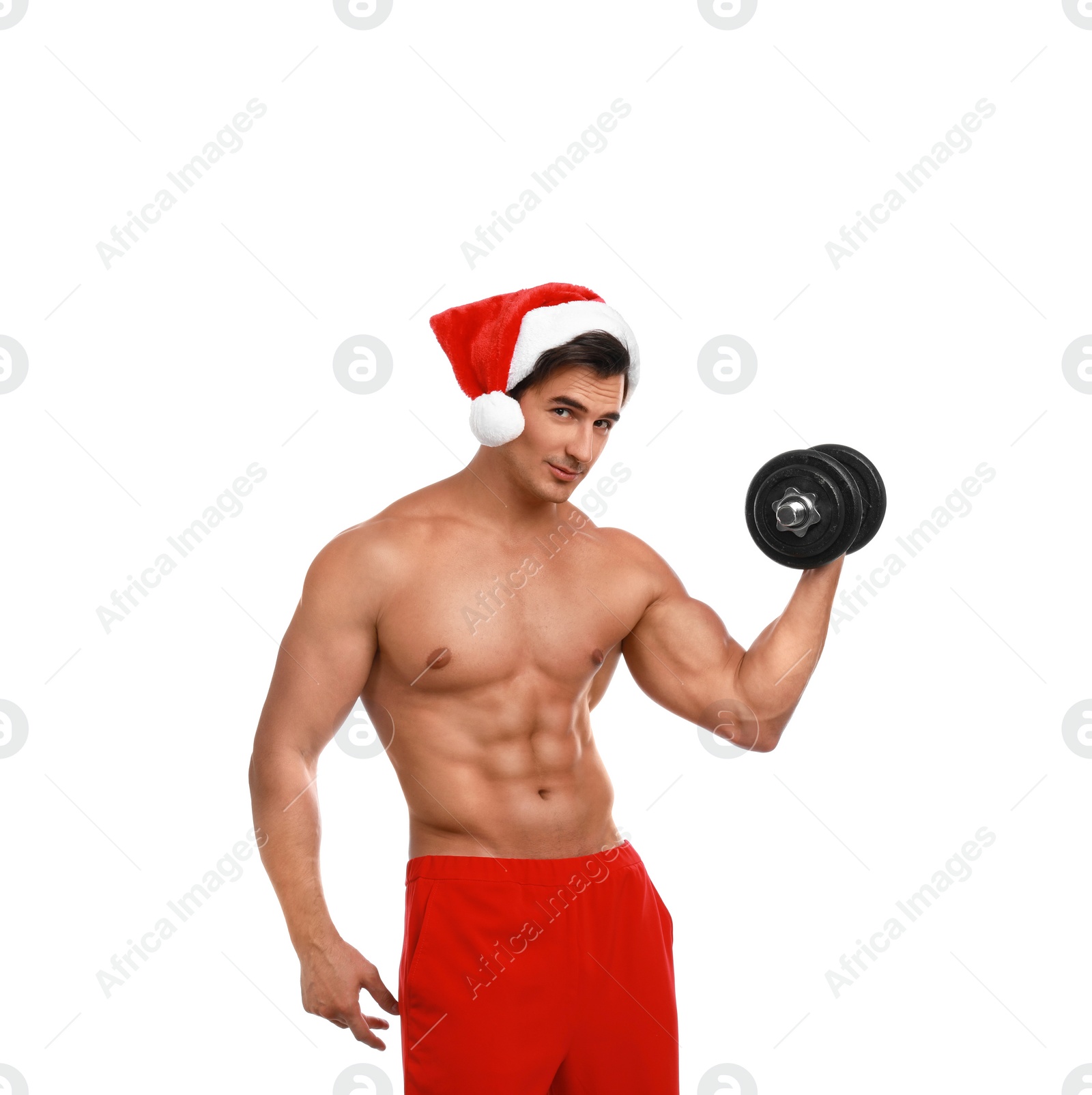 Photo of Sexy shirtless Santa Claus with dumbbell on white background