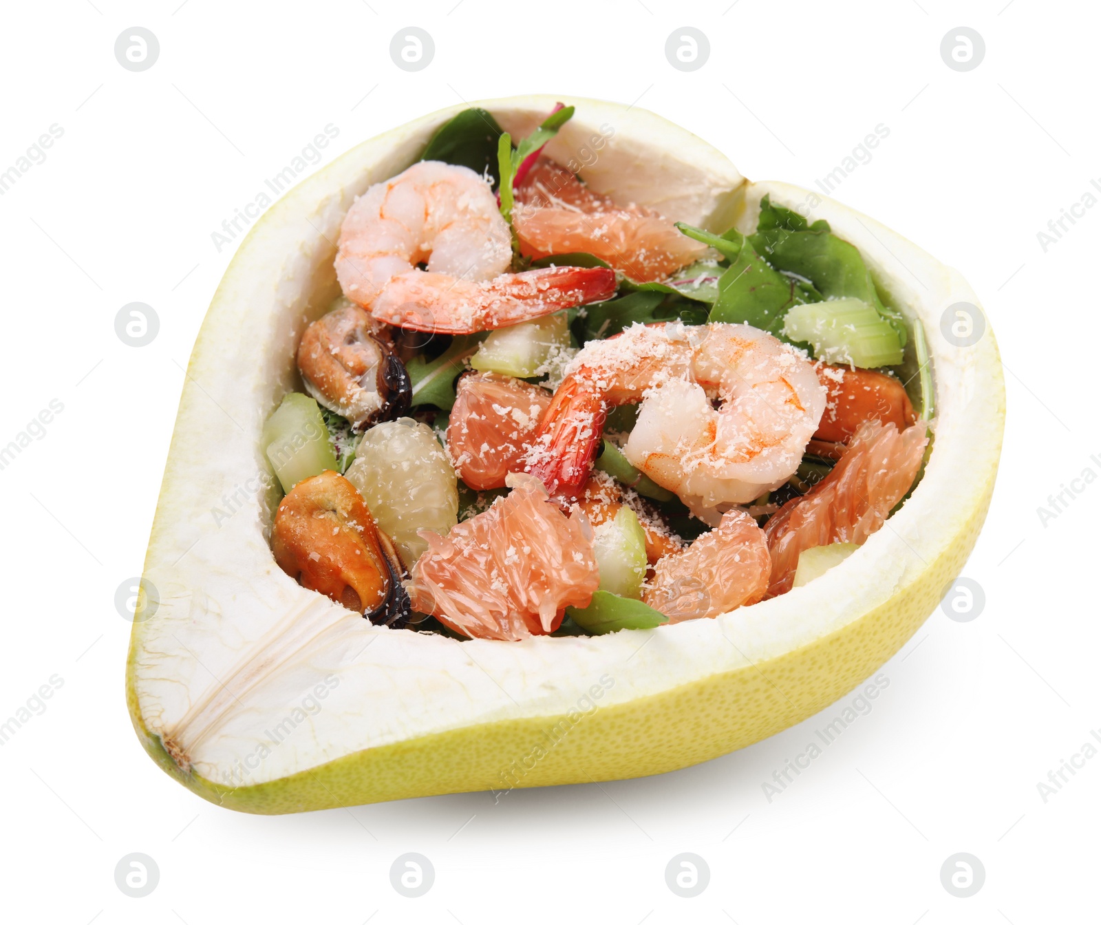 Photo of Delicious pomelo salad with shrimps in half of fruit isolated on white