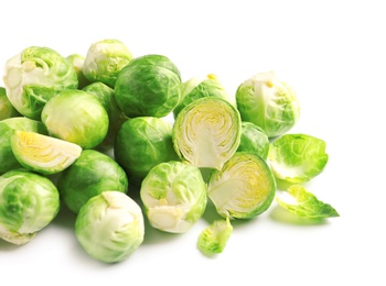 Pile of fresh Brussels sprouts on white background