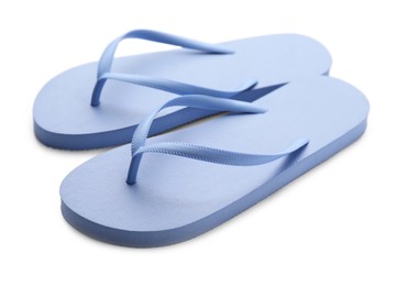 Photo of Stylish blue flip flops on white background. Beach object
