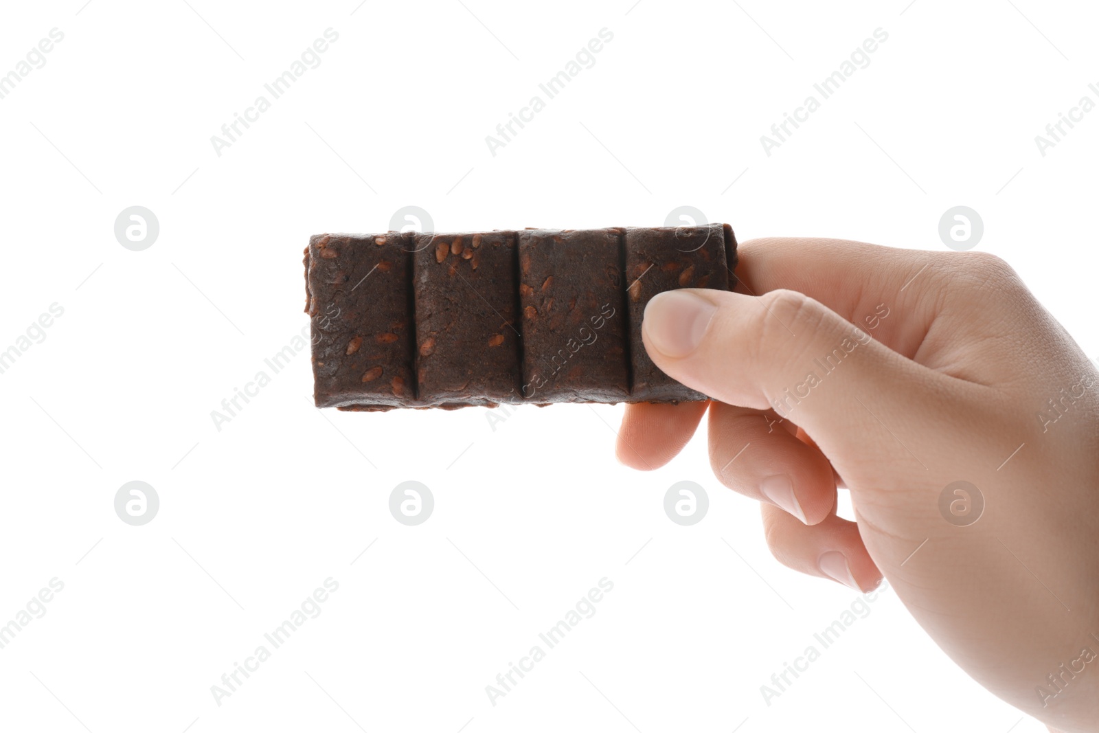 Photo of Woman holding hematogen bar on white background, closeup